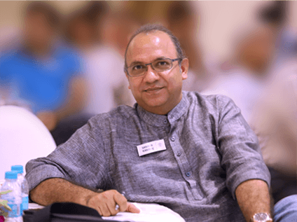 Portrait of Sameer Kamboj in conversation